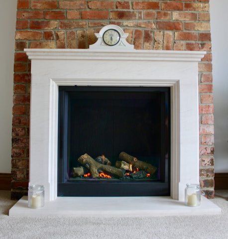 Gazco riva 750, logs, black reeded, lime stone surround, brick work, gas fire, Newcastle, gateshead, blazes fire surrounds